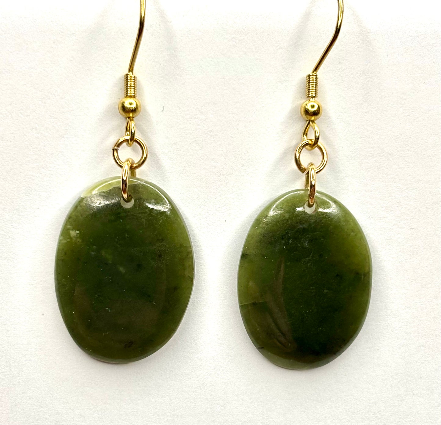 Olive green jade earrings.