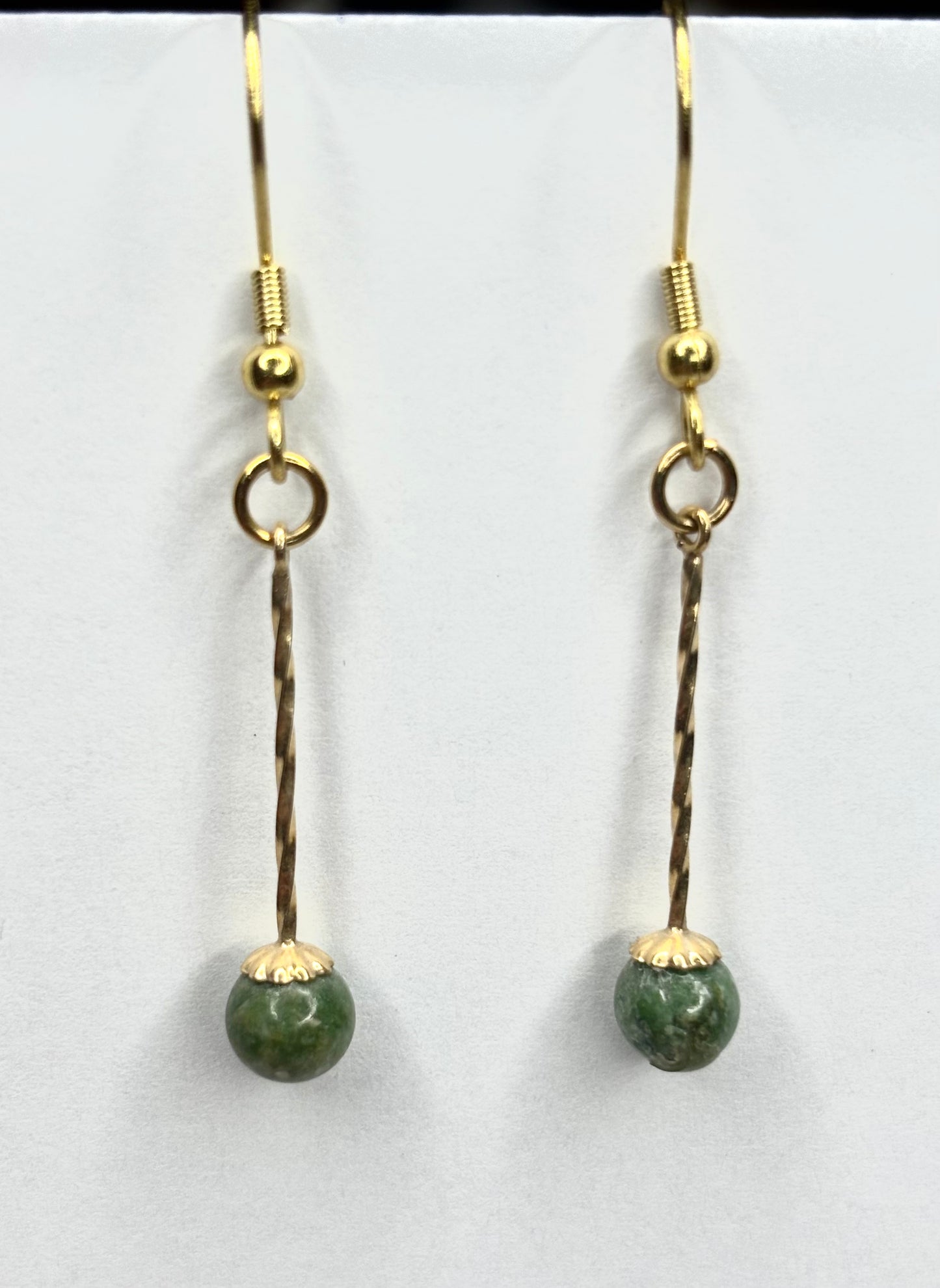 Green Jade dangles on gold plated hooks