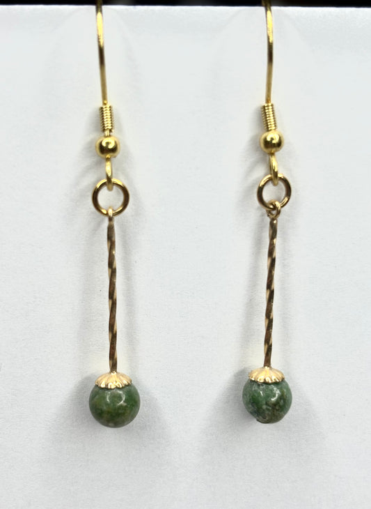 Green Jade dangles on gold plated hooks